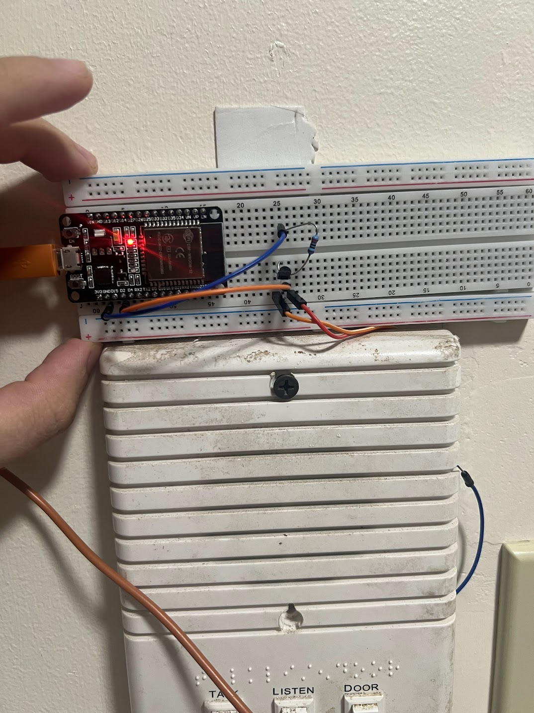 Circuit board with resistors added to prevent automatic triggering